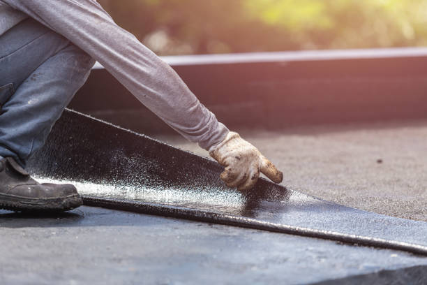 Professional Waterproofing technician working in Hatley, WI